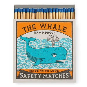 Box of matches with whale illustration on. Matches are tipped blue 