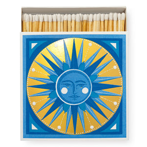 Box of long matches with beautiful golden sun design. White tipped matches