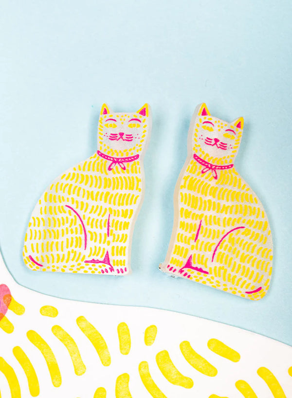 Cat Wearing a Ribbon Brooches by Tatty Devine