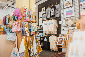 Photo of the inside of Form Shop & Studio featuring Hull merchandise, t-shirts, socks and other gifts