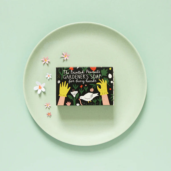 Box of 'The Printed Pantry Gardener's Soap' on a white plate with a light green background