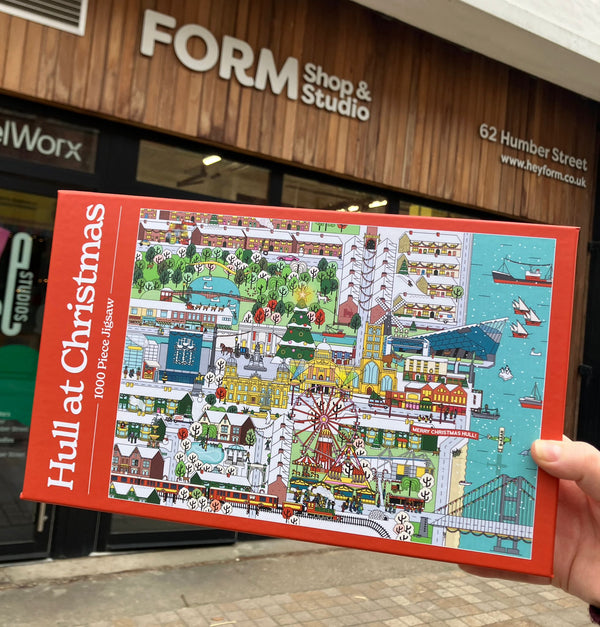 Hull at Christmas jigsaw held outside Form Shop & Studio