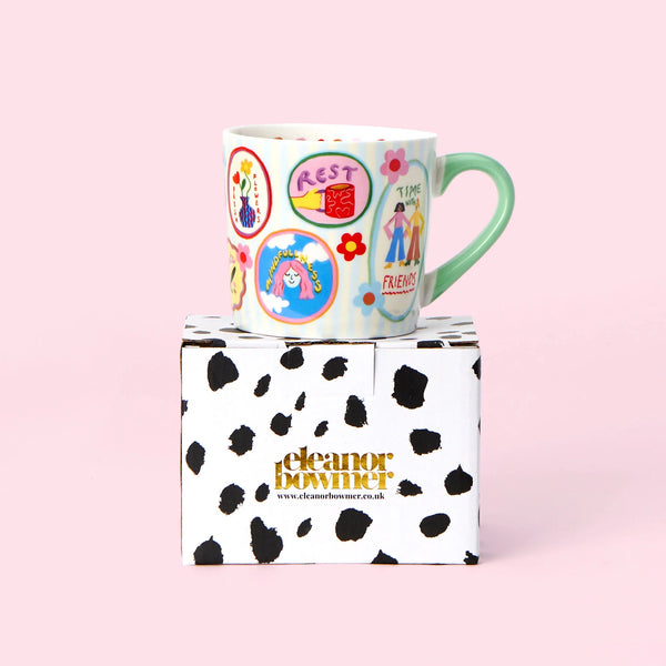 Fun colourful mug by Eleanor Bowmer with self care messages on. Lovely mug in gift box 