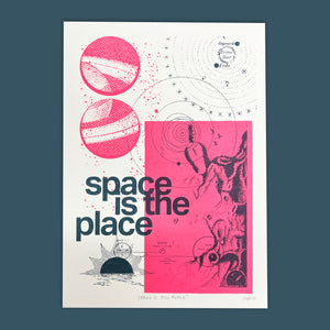 Space art screen print featuring sun ra in a Swiss typography style. Screen printed with 2 colour pink and navy blue and images of the moon, constellations and Saturn  