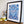 Load image into Gallery viewer, Framed geometric art print with blue and pink in a black frame 
